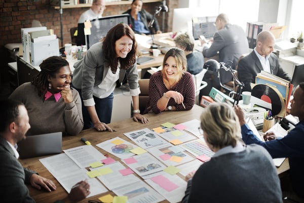 Nonprofit Management: Team planning with paper and sticky notes