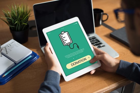 tablet with a "donation" on the screen