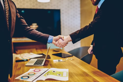 corporate sponsorship: shaking hands