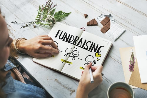 nonprofit fundraising: woman drawing about fundraising